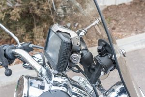 Garmin GPS mounted on top of the handlebars of a Harley Davidson