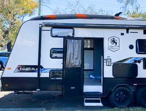 Close up of the removable roof rack on Caravan with surfboard installed