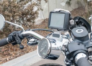 Garmin GPS mounted on top of the handlebars of a Harley Davidson