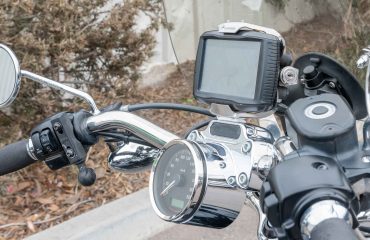 Garmin GPS mounted on top of the handlebars of a Harley Davidson